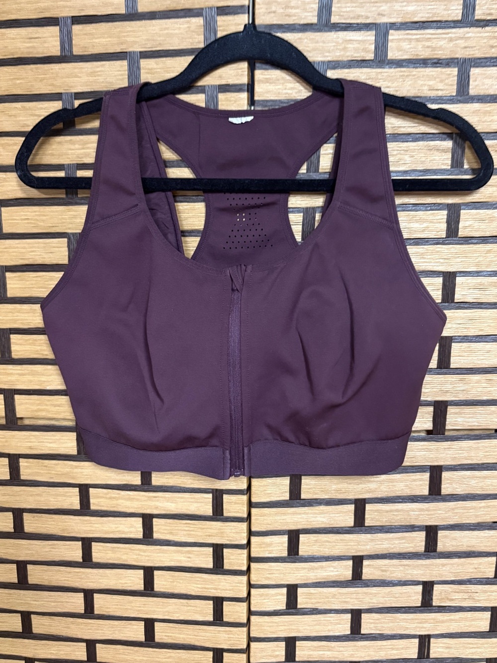 Fabletics burgundy zip front sports bra size large?